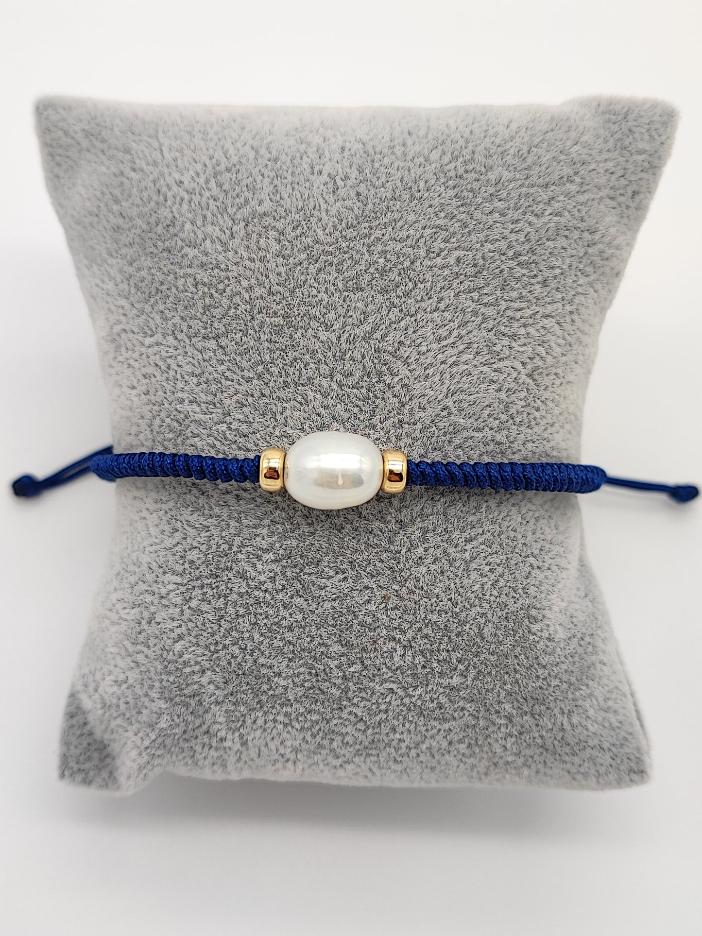 Pulsera azul con perla