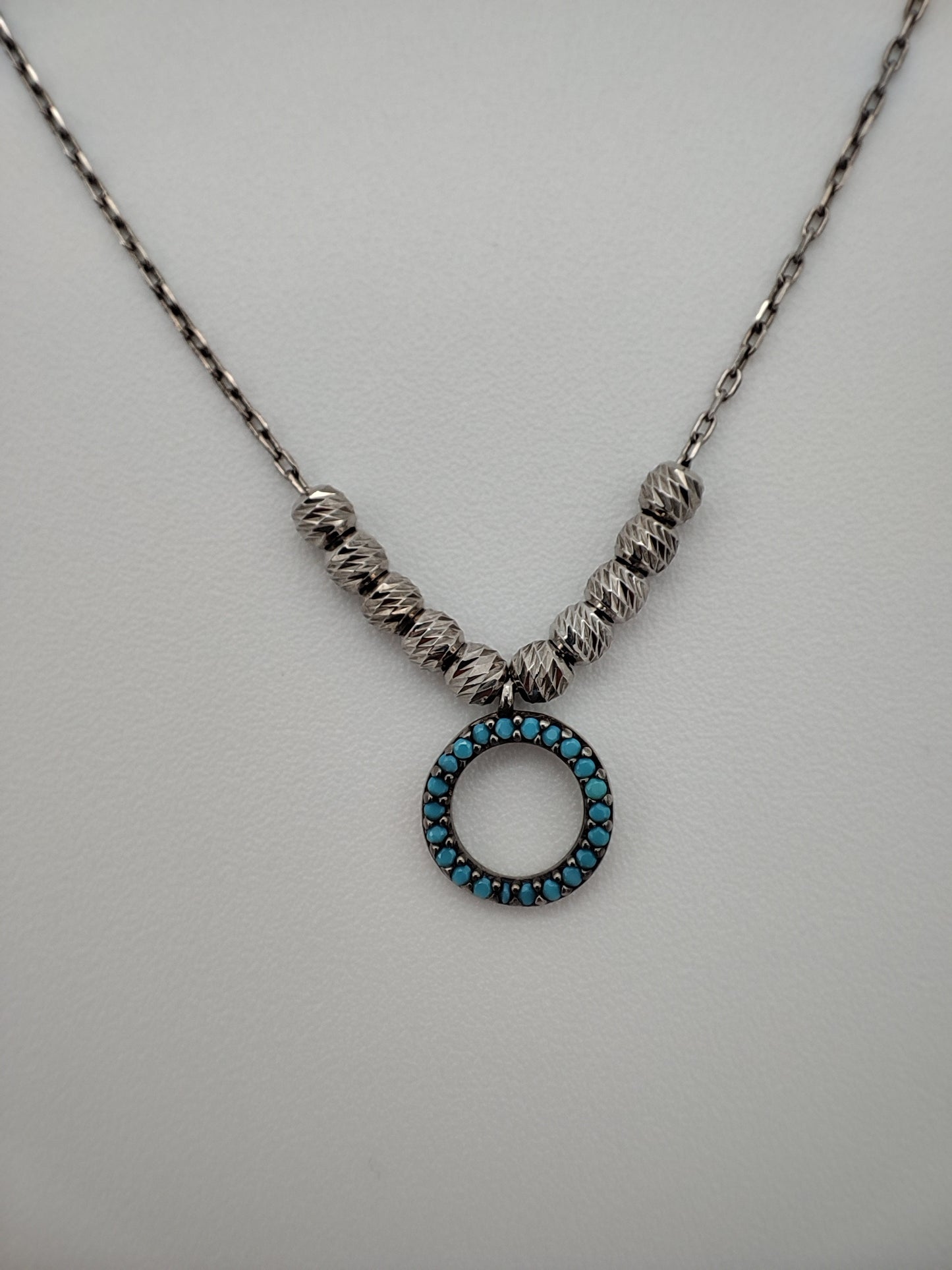Collar plata con dije circulo azul