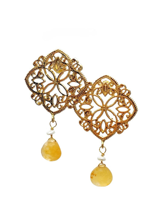 Aretes flor con grecas y cristal amarillo