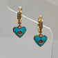 Arracada chica con corazon azul con cristal