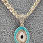 Collar ojo ovalado azul con cristales