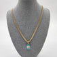 Collar ojo ovalado azul con cristales