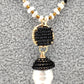Juego collar y aretes negro con perlas