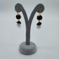 Juego collar y aretes negro con perlas