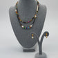 Juego collar dos niveles y aretes con perlas