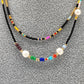 Juego collar dos niveles y aretes con perlas