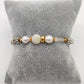 Pulsera gris con perlas y cristales