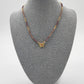 Collar morado con mariposa