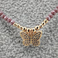 Collar morado con mariposa