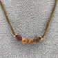 Juego collar y pulsera con piedras
