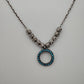 Collar plata con dije circulo azul
