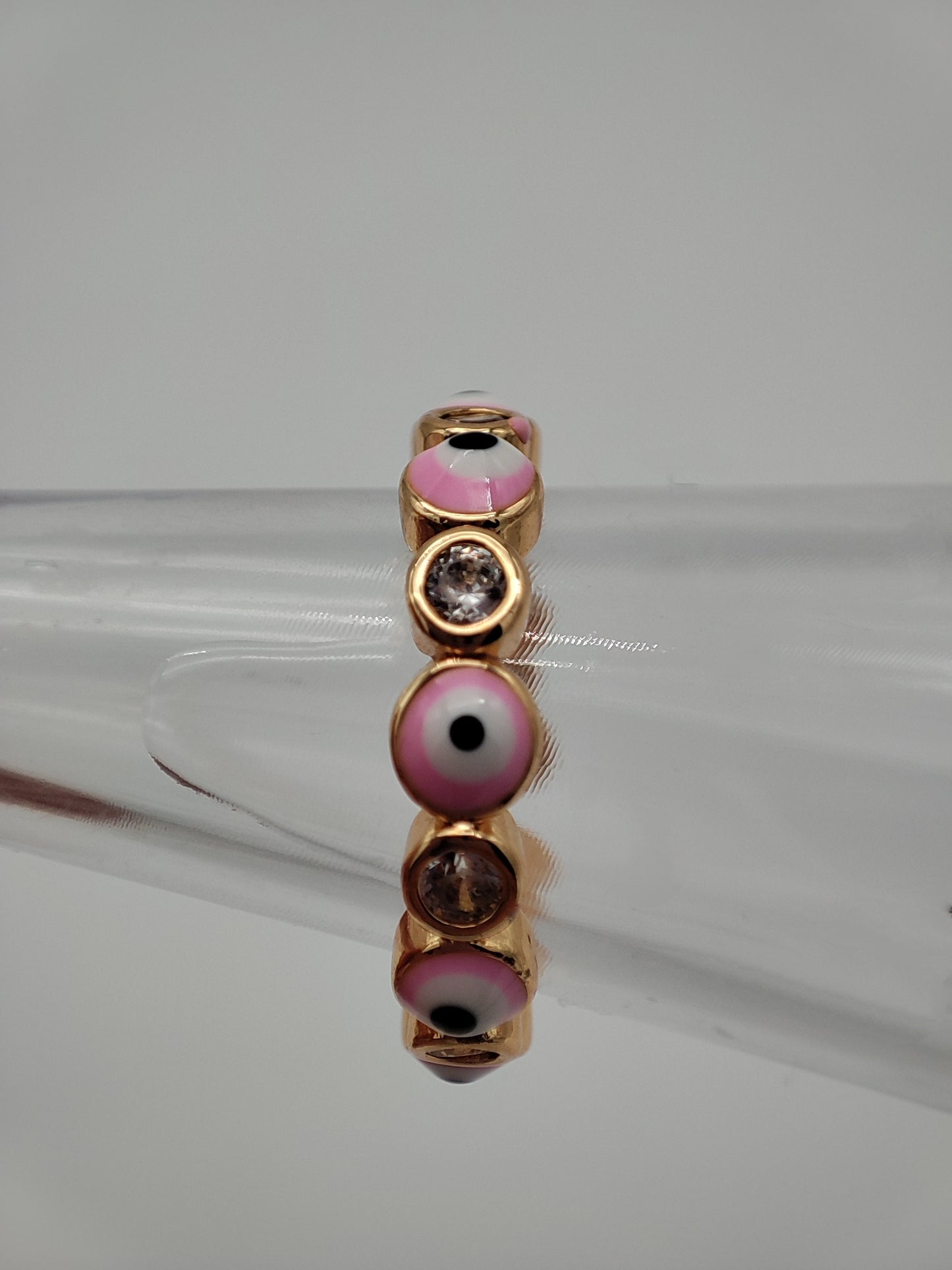 Anillo ajustable ojos rosas y cristales