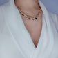 Cadena con dijes circulo y ojos azules